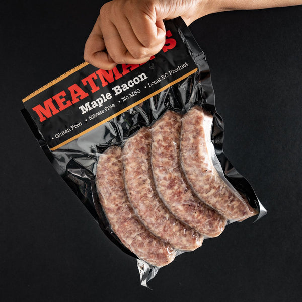 Person holding Maple Bacon Sausage