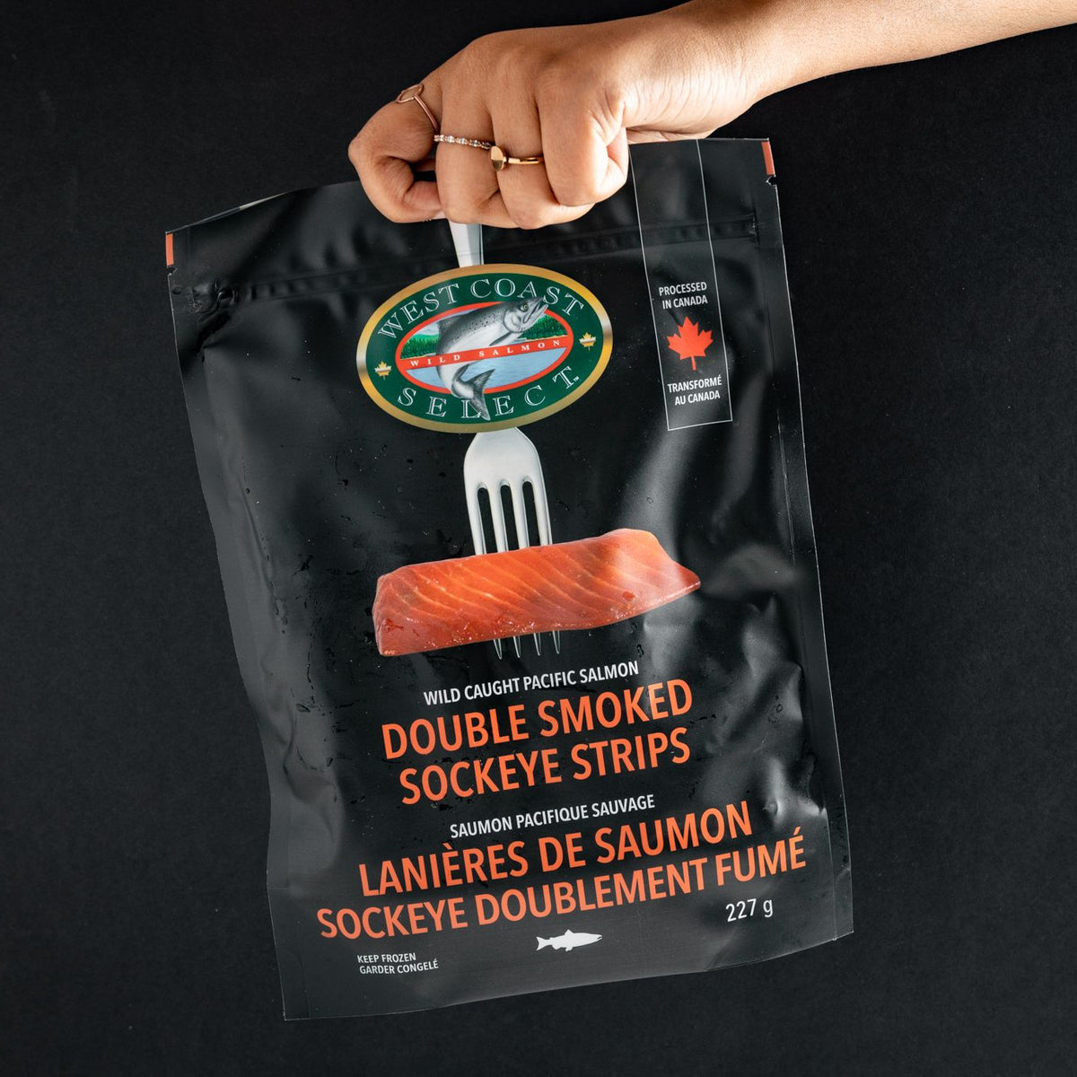 person holding Sockeye Strips