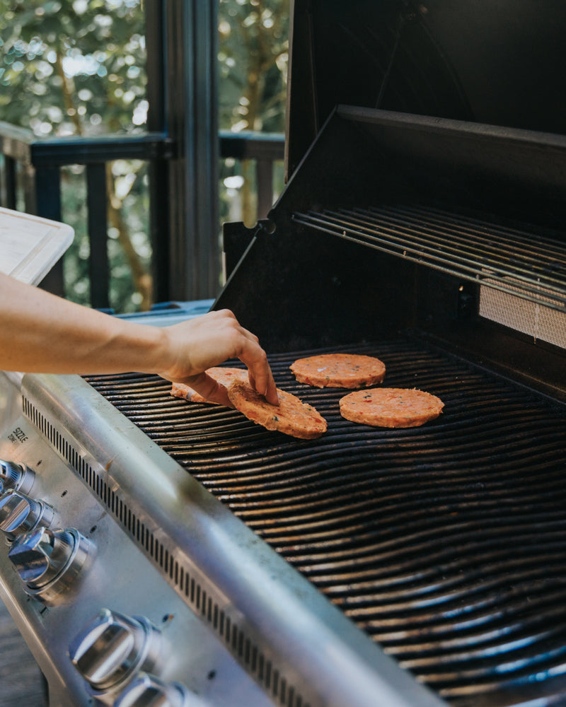 person grilling bacons