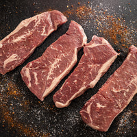 four slices of fresh steaks